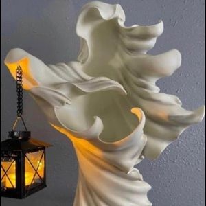 Resin ghost holding lantern